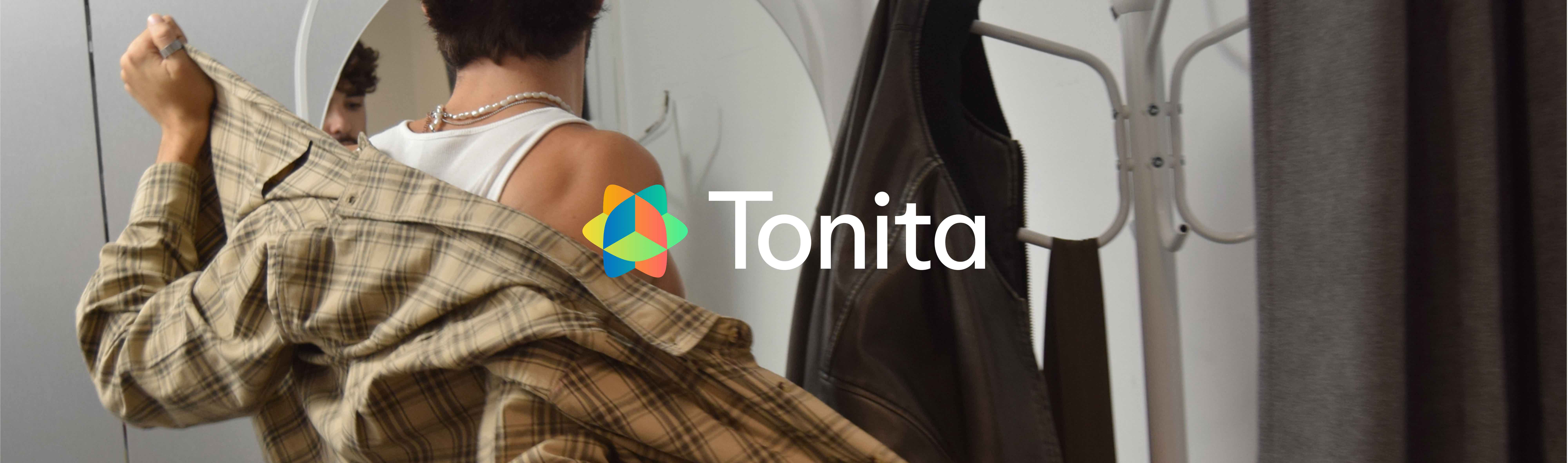 Tonita logo over a fitting-room scene of a person trying on a plaid flannel shirt
